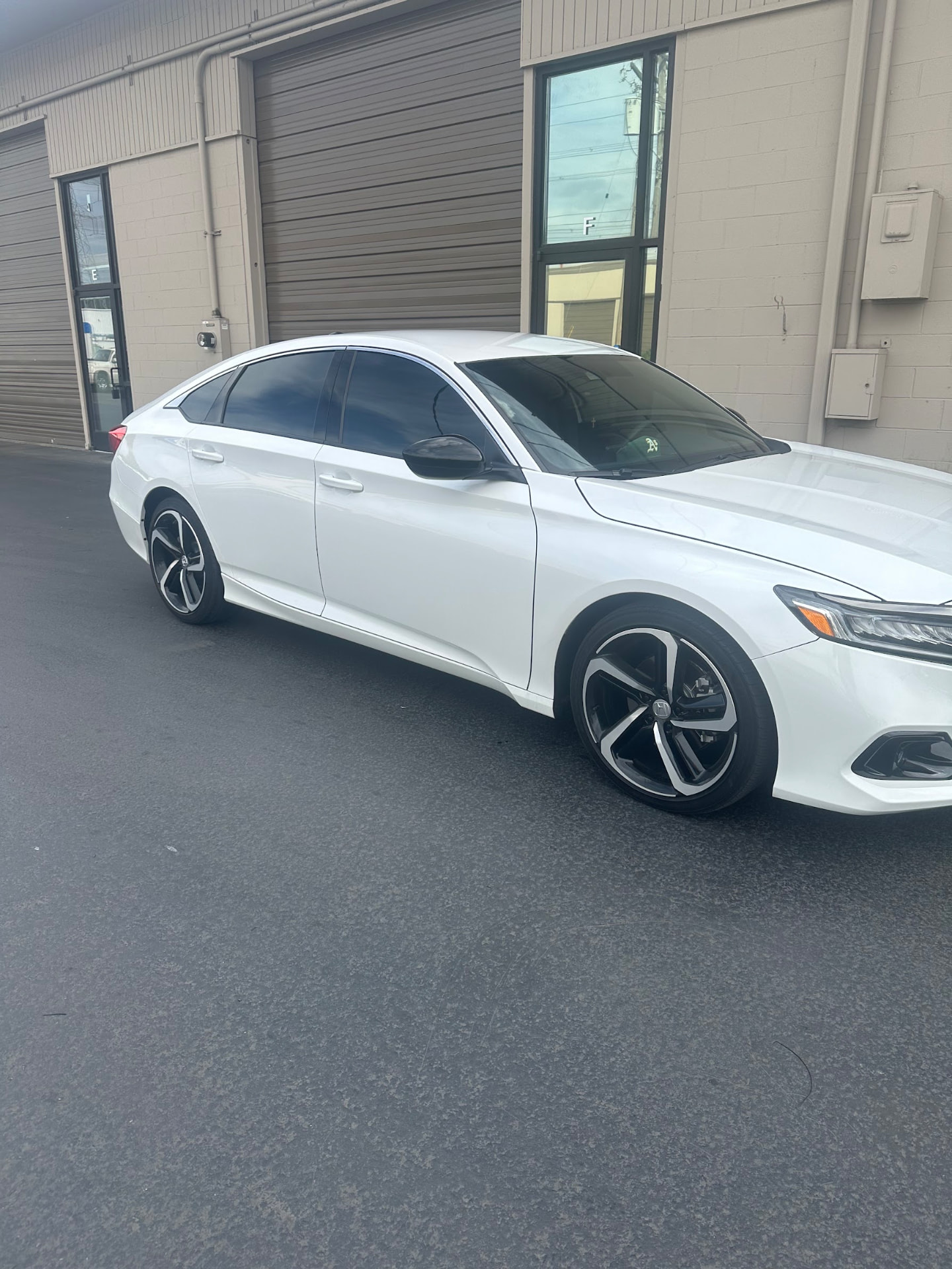 White Honda Accord Sport with tinted windows